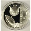 Image 1 : CONFIRMATION ONE OUNCE .999 SILVER ROUND IN PROTECTIVE PLASTIC CAPSULE