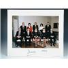 Image 1 : H.R.H. The Princess of Wales. Colour photograph of Diana with staff, signed on mount "Diana. 1995",.
