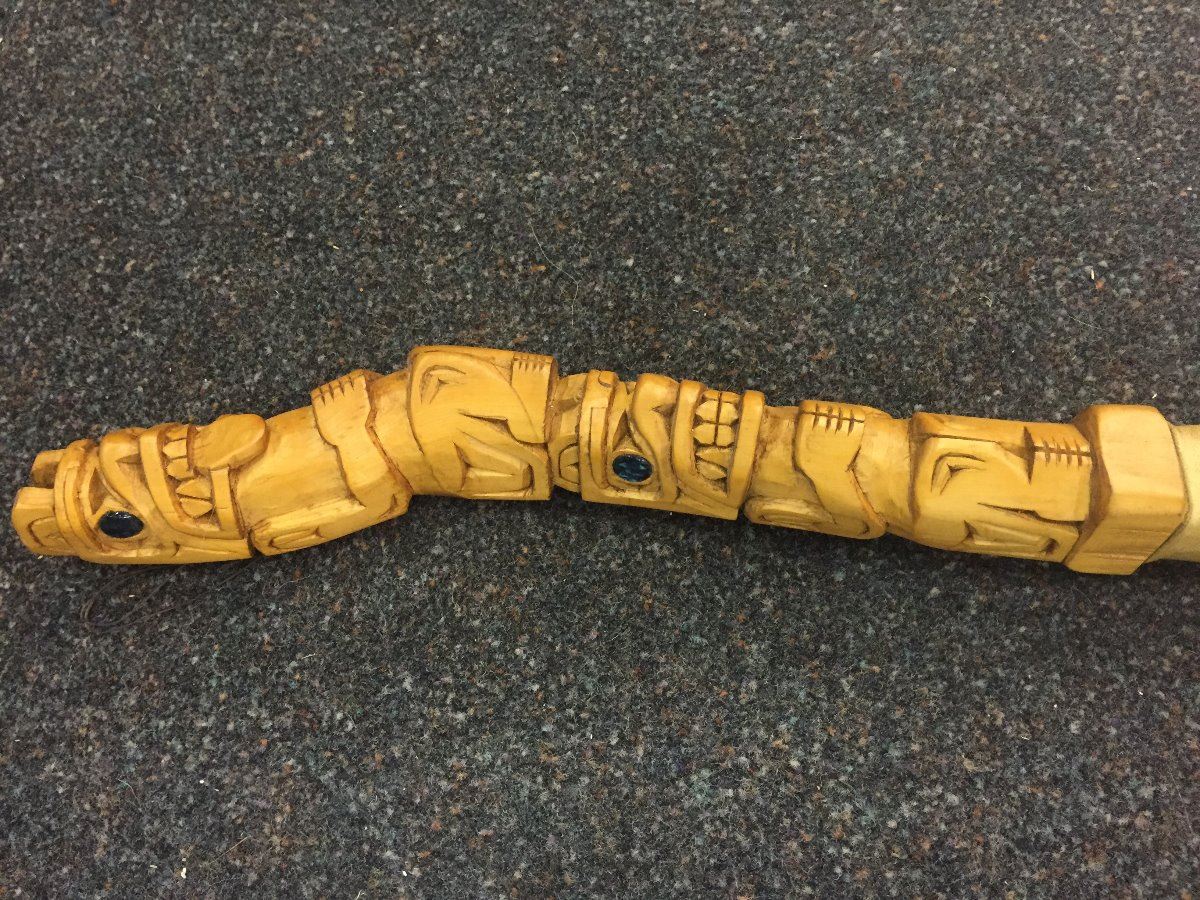 HAND CARVED TALKING STICK WITH LEATHER HANDLE AND SHELL INLAY, 20