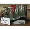 Image 2 : LOT OF 4 VINTAGE COCA-COLA BOTTLES WITH DISPLAY STAND