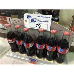 2004 ATHENS OLYMPICS 6 PACK COCA-COLA BOTTLES WITH STAND - Able