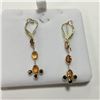 Image 1 : ONE PAIR OF 14KT YELLOW GOLD ORANGE SAPPHIRE AND BLACK DIAMOND DANGLING EARRINGS WITH A TOTAL OF 6