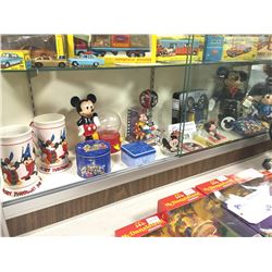 SHELF LOT OF COLLECTABLES INCL. DISNEY AND MICKEY MOUSE TOYS, WATCHES, GUMBALL, PEZ AND MORE!