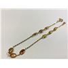 Image 2 : ONE 10KT YELLOW GOLD FANCY SAPPHIRE BRACELET. 9 OVAL MIXED CUT FANCY SAPPHIRES, CONSISTING OF