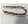 Image 2 : ONE STERLING SILVER (RHODIUM FINISH) BRACELET, SET WITH PROMOTIONAL QUALITY RUBIES. 93 PEAR SHAPED