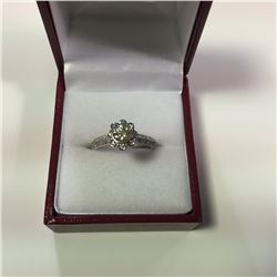 ONE LADIES 14KT WHITE GOLD DIAMOND SET ENGAGEMENT OR DRESS RING.  ROUND SHAPED FLORAL INSPIRED