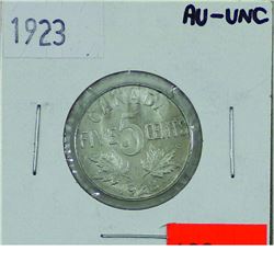 5-cent 1923 in AU-UNC condition. A flashy coin.