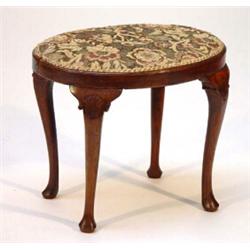 Oval walnut dressing stool on shell carved cabriole legs…