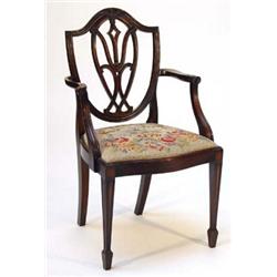 Mahogany shieldback open armchair with wheatsheaf carvings and needlepoint seat…