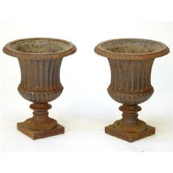 Pair of square based cast iron garden urns, 50cm high…