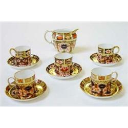 Selection of Royal Crown Derby Imari patterned teaware, comprised cream jug, five coffee cans and…