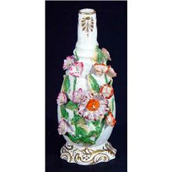 Hand painted 19th century porcelaineous bud vase, decorated in floral relief, 17cm high…