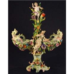 Continental porcelain hand painted centerpiece with floral relief and maiden and putti decoration…