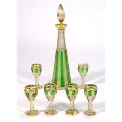 Hand gilded green overlay clear glass liqueur set, comprising decanter and six glasses with star …