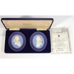 Cased pair of Wedgwood three coloured Jasperware portrait plaques, Josiah Wedgwood and Thomas Ben…