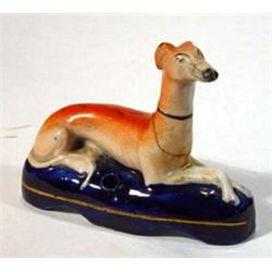 Hand painted Victorian staffordshire greyhound inkwell on a cobalt blue base, 10cm high…