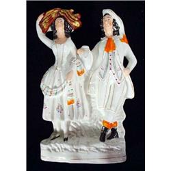 Hand painted Victorian Staffordshire figure group of a gentleman and woman, 32cm high…