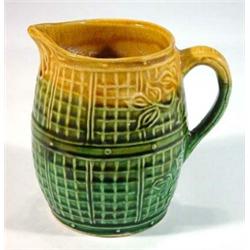 Majolica basketweave and leaf design jug, decorated in greens and yellows, 14cm high…