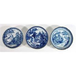 Three Chinese blue and white saucers decorated with chinoiserie scenes, largest 14cm diameter…