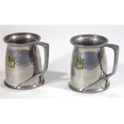 Two hammered pewter Libertys Tudric golfing mugs, marks to base, 10cm high…