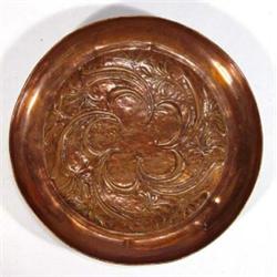 Circular copper dish, decorated with stylised flowers, 18cm diameter, marks to base…