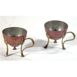 Pair of WMF copper and brass eggcups on splayed feet…