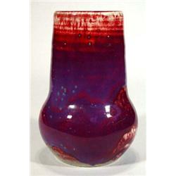 Ruskin highfired stoneware vase, decorated in a lavender and ox blood red glaze with ferruginous …