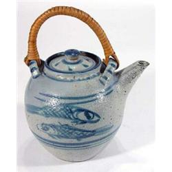 Michael Cardew 'Volta Nigeria' Studio pottery teapot, decorated with blue fish and wicker handle,…