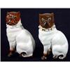 Image 1 : Two handpainted seated porcelain pug dogs, 12cm high…