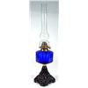 Image 1 : Oil lamp with cast pierced metal base, blue glass reservoir and flute, 60cm high…