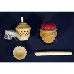 Vegetable ivory pin cushion, tape measure and needlecase…