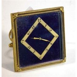 Square blue enamelled and brass Goldsmiths & Silversmiths eight day travelling clock with bevelle…