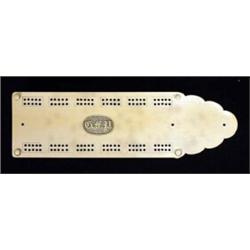 19th century shaped ivory cribbage board with counter tray to underneath, 24cm in length…