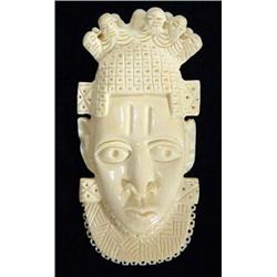 Carved ivory ethnic face mask, 16cm high…