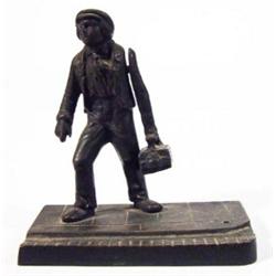 Bronze workman match striker on rectangular base, 10cm high…