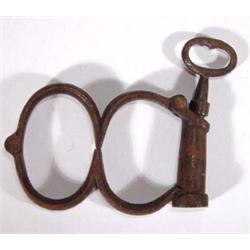 Pair of cast iron screw lock Victorian handcuffs…