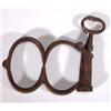 Image 1 : Pair of cast iron screw lock Victorian handcuffs…