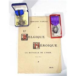 Two military boxed medals, a copy of 'La Belgique Heroique'…