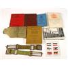 Image 1 : Boxed of World War II military items including field dressings, soldier's service paybook, visual…