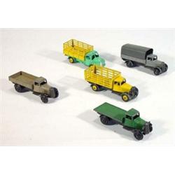 Five Dinky Toys vans including a Dodge, grey wagon, green flat truck, yellow market gardener's va…