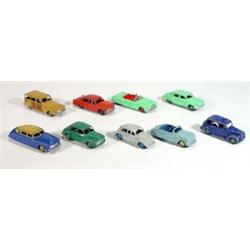 Selection of nine Dinky Toys cars including Austin Atlantic, Volkswagen, Studebaker, Hudson Sedan…