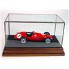 Image 1 : Tonka Ferrari 500 model in a glazed display case on a wooden stand and ephemera…