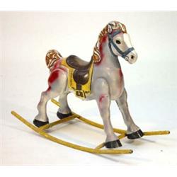 Hand painted tin child's rocking horse, 75cm high…