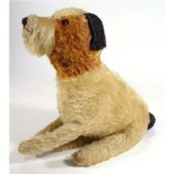 Edwardian seated straw filled terrierdog with glass eyes, 35cm high…