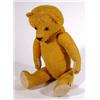 Image 1 : Old straw filled teddy bear with jointed limbs and glass eyes, 60cm high…