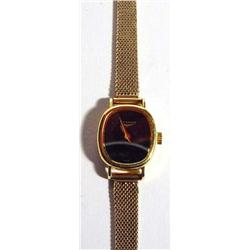 Ladies' Longines black faced wristwatch on a 9ct gold bracelet…