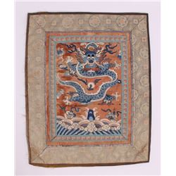 Chinese embroidered silk panel of a flying dragon above