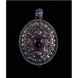 Garnet and sterling silver locket that opens, 19th