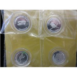 4 x .999 Silver Australian Mint rounds-1 gram each