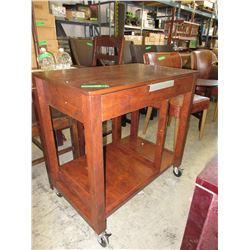 Small rolling desk with pullout keyboard tray
